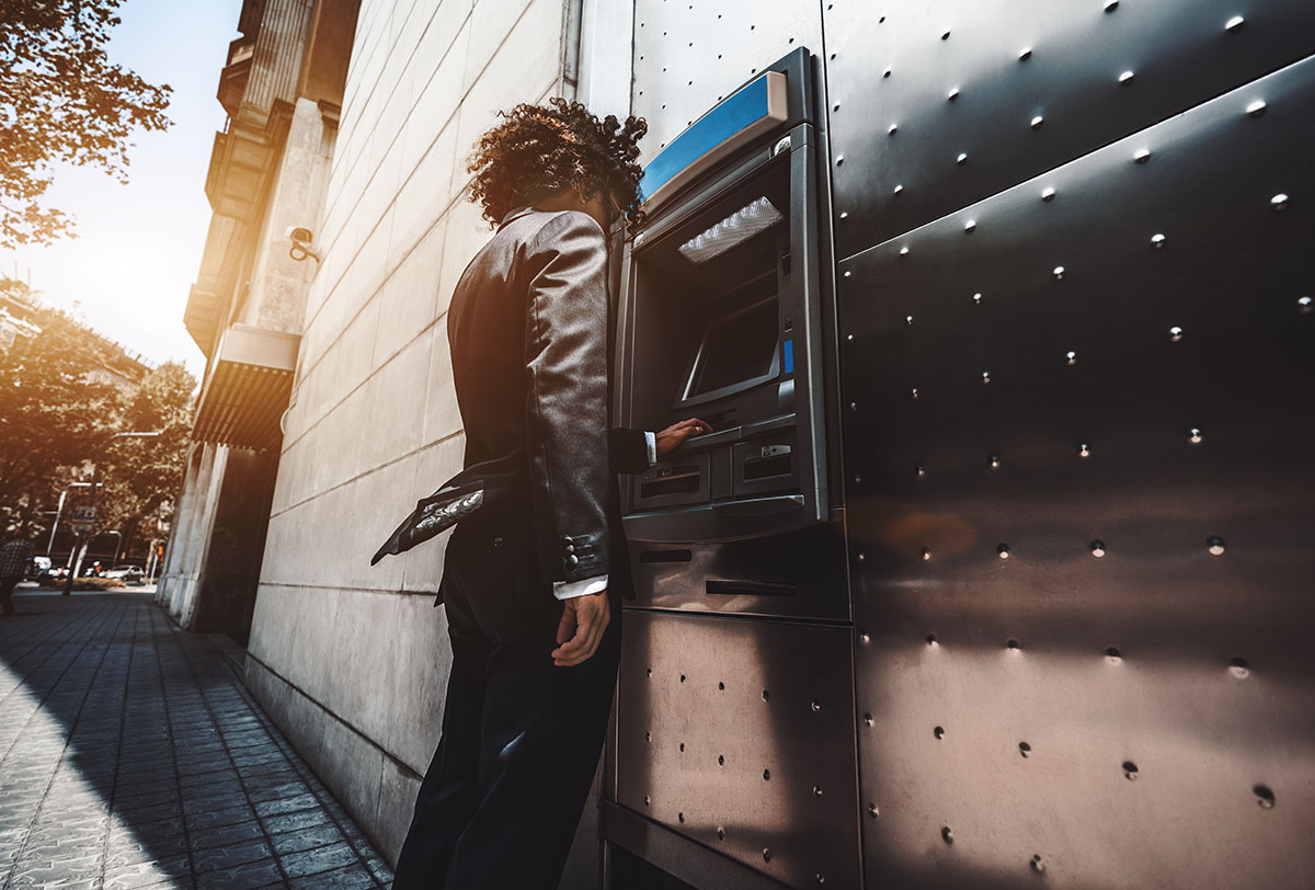 Man using an ATM